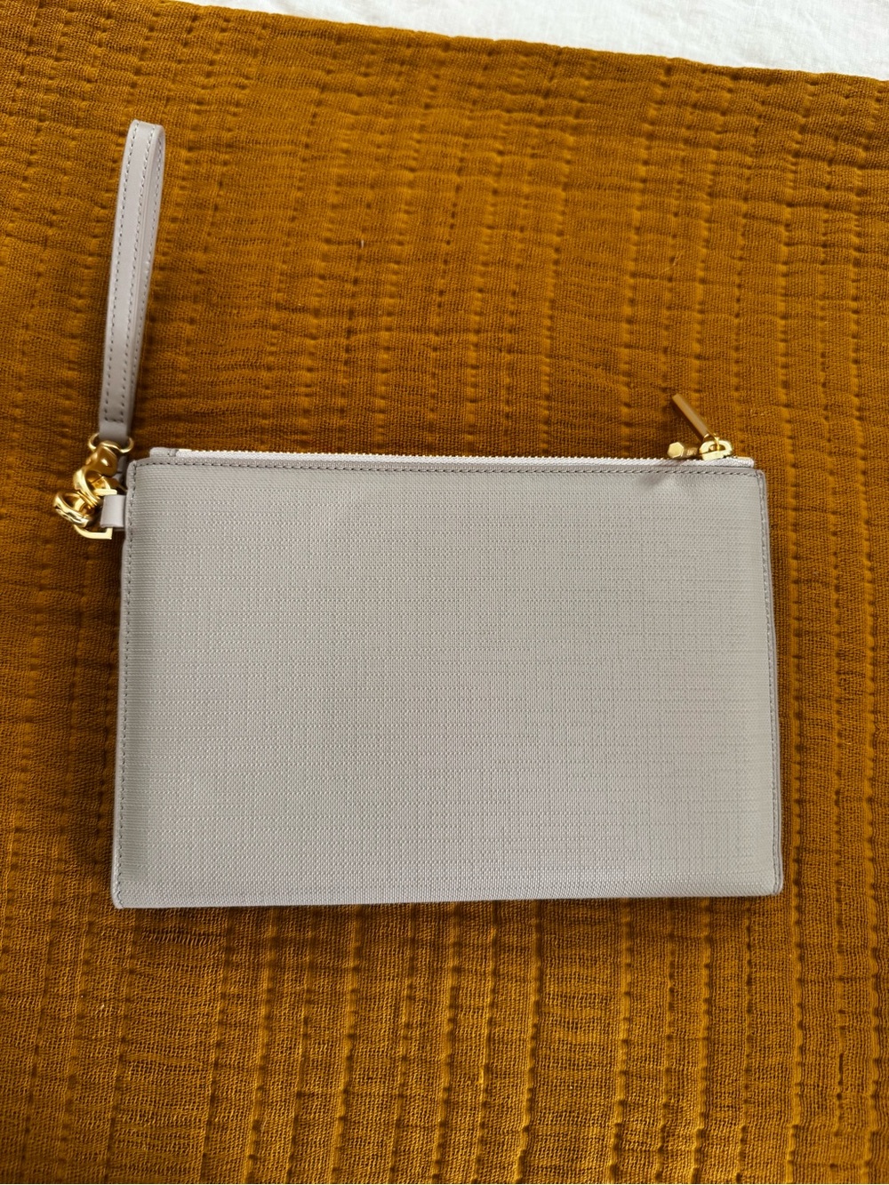 Dagne Dover Light Gray Wristlet Clutch with Gold Hardware